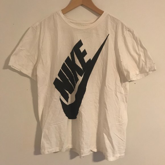 white nike shirt with black swoosh
